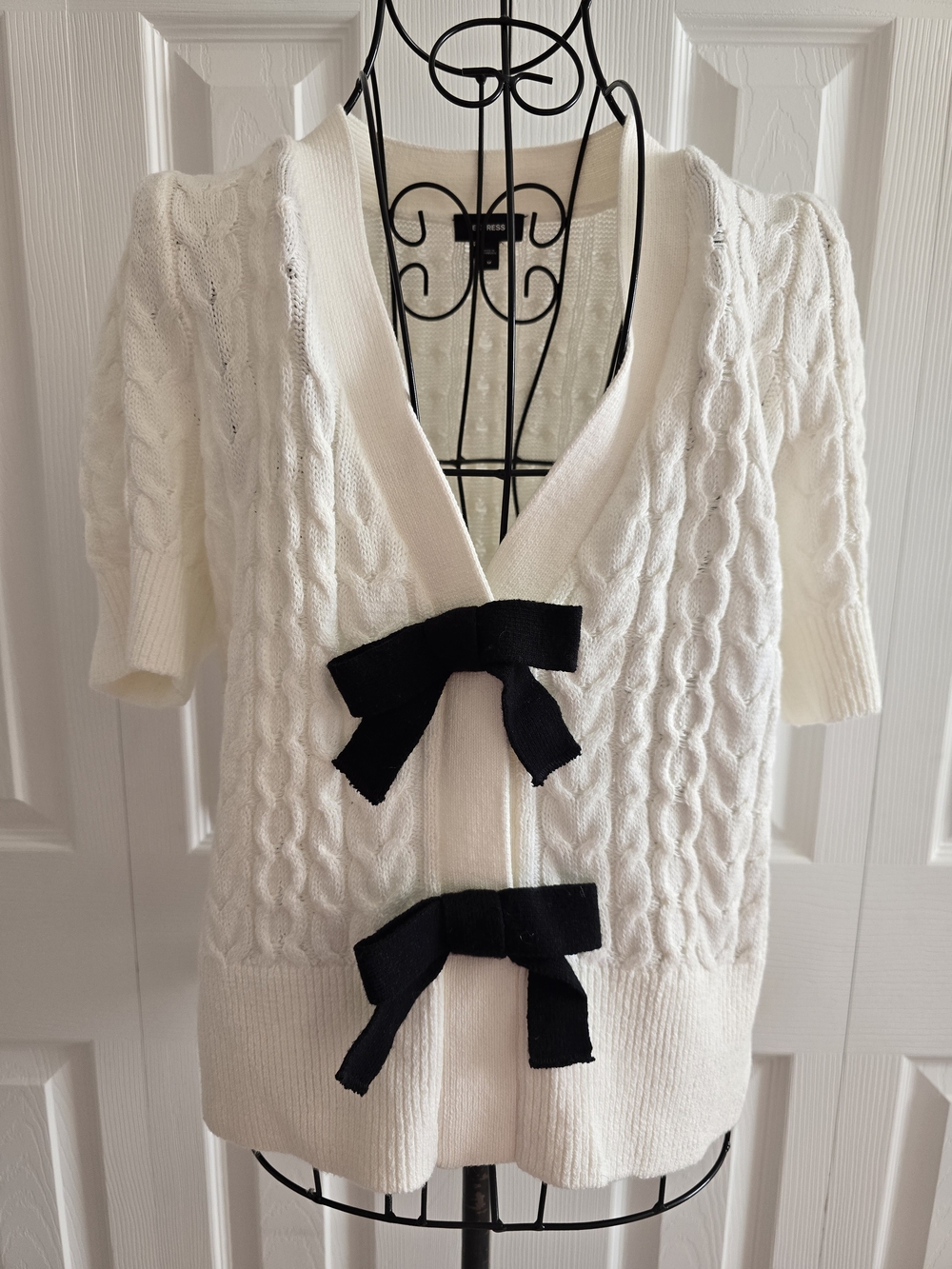 Express Cream Cable-Knit Short Sleeve Cardigan with Black Bows